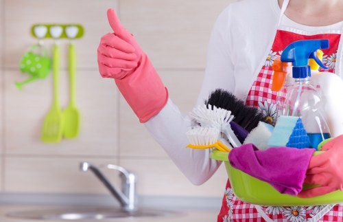 Detailed post-construction cleaning of kitchen surfaces and fittings
