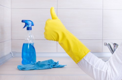 Local office cleaners maintaining desks and floors in N22